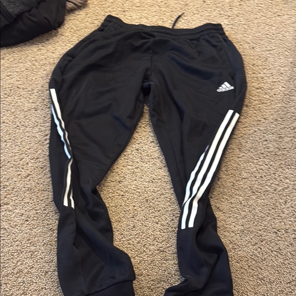 Adidas Black and White Sweatpants with Iconic Stripes